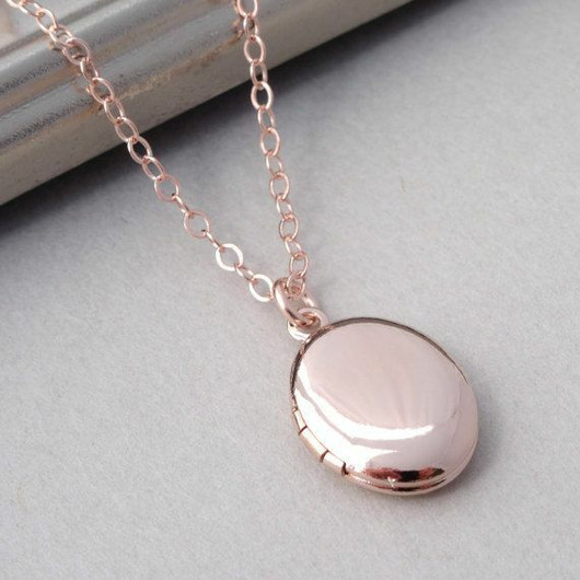 Korutuote Oy- Medaljonki, hopea. Rosé