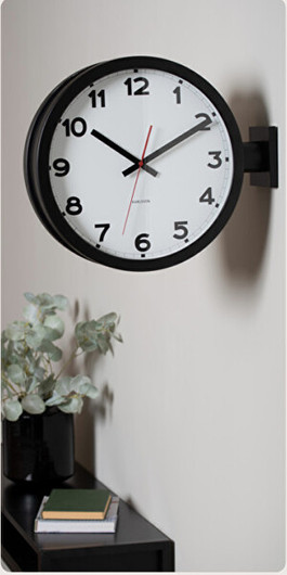 Karlsson- Seinäkello, asemakello