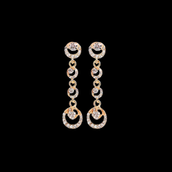 Kullanväriset roikkuvat pyörylä strassikorvakorut