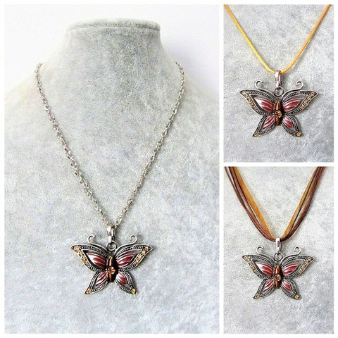 Antiikkihopean värinen punaisenruskea perhoskaulakoru
