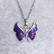 Kaunis emaloitu kimalteleva violetti perhonen kaulakoru