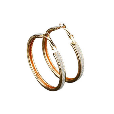 Kimaltavat kullanväriset korvarenkaat 5cm