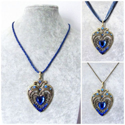 Koristeellinen antiikkipronssi sydänkaulakoru sinisillä korukivillä