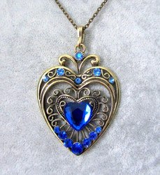 Koristeellinen antiikkipronssi sydänkaulakoru sinisillä korukivillä