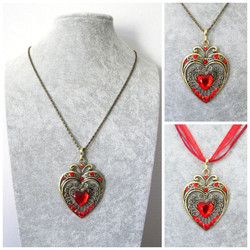 Koristeellinen antiikkipronssi sydänkaulakoru punaisilla korukivillä
