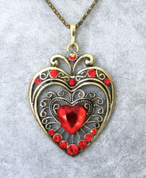 Koristeellinen antiikkipronssi sydänkaulakoru punaisilla korukivillä
