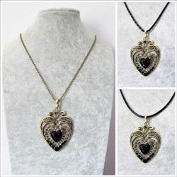 Koristeellinen antiikkipronssi sydänkaulakoru mustilla korukivillä