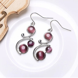 Violetit / viininpunaiset roikkuvat kissansilmä korvakorut