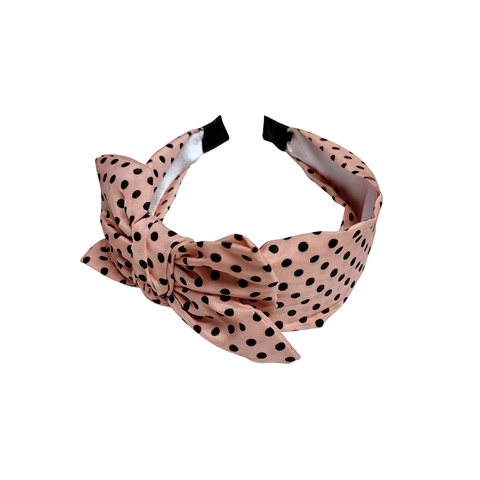 Leveä vaaleanpunainen polka dot rusettipanta mustilla pilkuilla