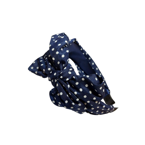 Leveä tummansininen polka dot rusettipanta valkoisilla pilkuilla