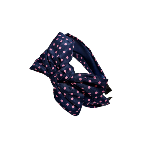 Leveä tummansininen polka dot rusettipanta pinkin värisillä pilkuilla