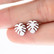 Pienet peikonlehti nappikorvakorut ruostumaton teräs 1x1cm