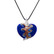 Sininen kultakoristeinen lasisydän kaulakoru mustalla nauhalla