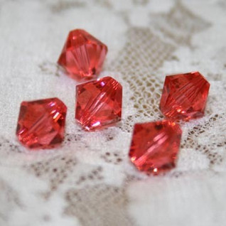 Swarovski 4 mm bicone padparadscha