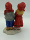 Girl and boy figurine