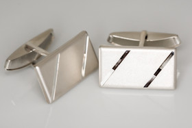 Timanttileikatut kalvosinnapit