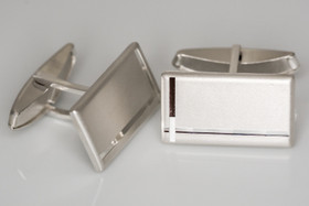 Timanttileikatut kalvosinnapit