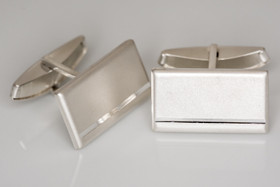 Timanttileikatut kalvosinnapit