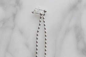 Oliiviketjukorvakorut