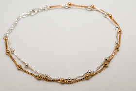 Kaksinkertainen nilkkaketju