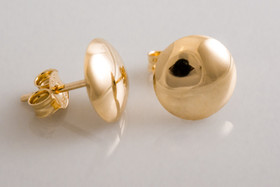 Puolipallokorvakorut