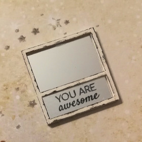 Miniatyyri Peili tekstillä 