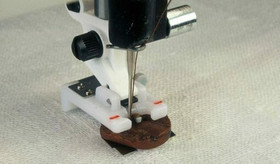 Husqvarna Viking nappijalka ja asetin