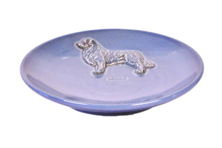 Australianpaimenkoira teelautanen tai kauhanalunen