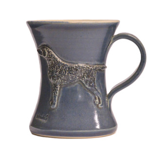 Kiharakarvainen noutaja muki