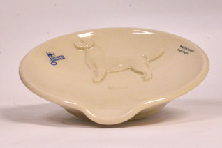 Kultainennoutaja teelautanen tai kauhanalunen