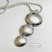 Kolmen kolikon riipus 