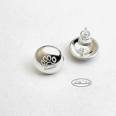 Nappikorvakorut Tassu