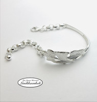 Lusikkarannekoru Käpy