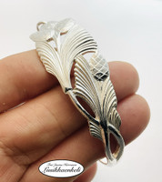 Lusikkarannekoru Käpy