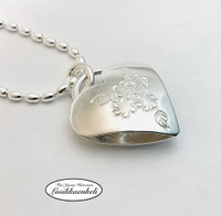 Sydänriipus Kukkaset