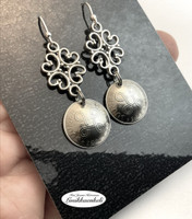 Markkakorvakorut ornamentti koristeella 1954-1962