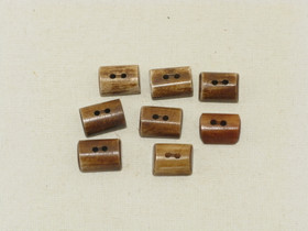 Puhvelinluunappi, puolikas halko, hennavärjätty