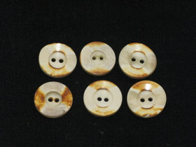 Puhvelinluunappi, poltettu