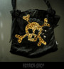 Sinister skul and bones handbag