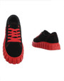 Black sneakers with shocking red bottom