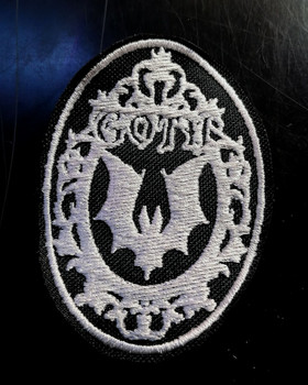 Goottilepakko kehyksillä, musta