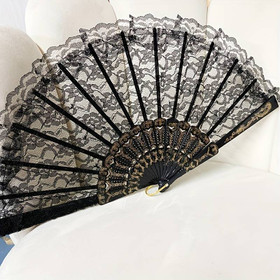 Black fan with gold colour ornaments