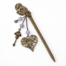 Antiikki pronssinen kirjanmerkki, Riikinkukko	