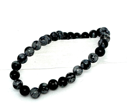 Lumihiutale Obsidiani Kivirannekoru 17 cm	