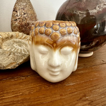 Tuoksulyhty tai Suitsukealusta Buddha 	