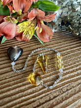 Heiluri Sitriini, kristallilla, Sitriini kivillä ja kissansilmä sydämellä	