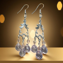 Korvakoru persikkainen ja lila kristalli	