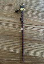 Noidan sauva Tiikerinsilmällä ja Mahonkiobsidiaani kuulla	