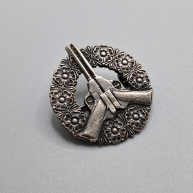 Ampumamerkki, pistooli, hopeaa v. 1927