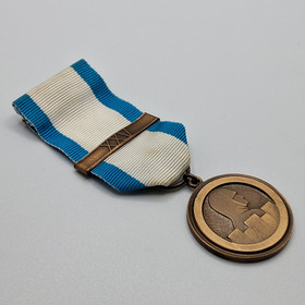 Sotaveteraanien ansiomitali, solki XXV